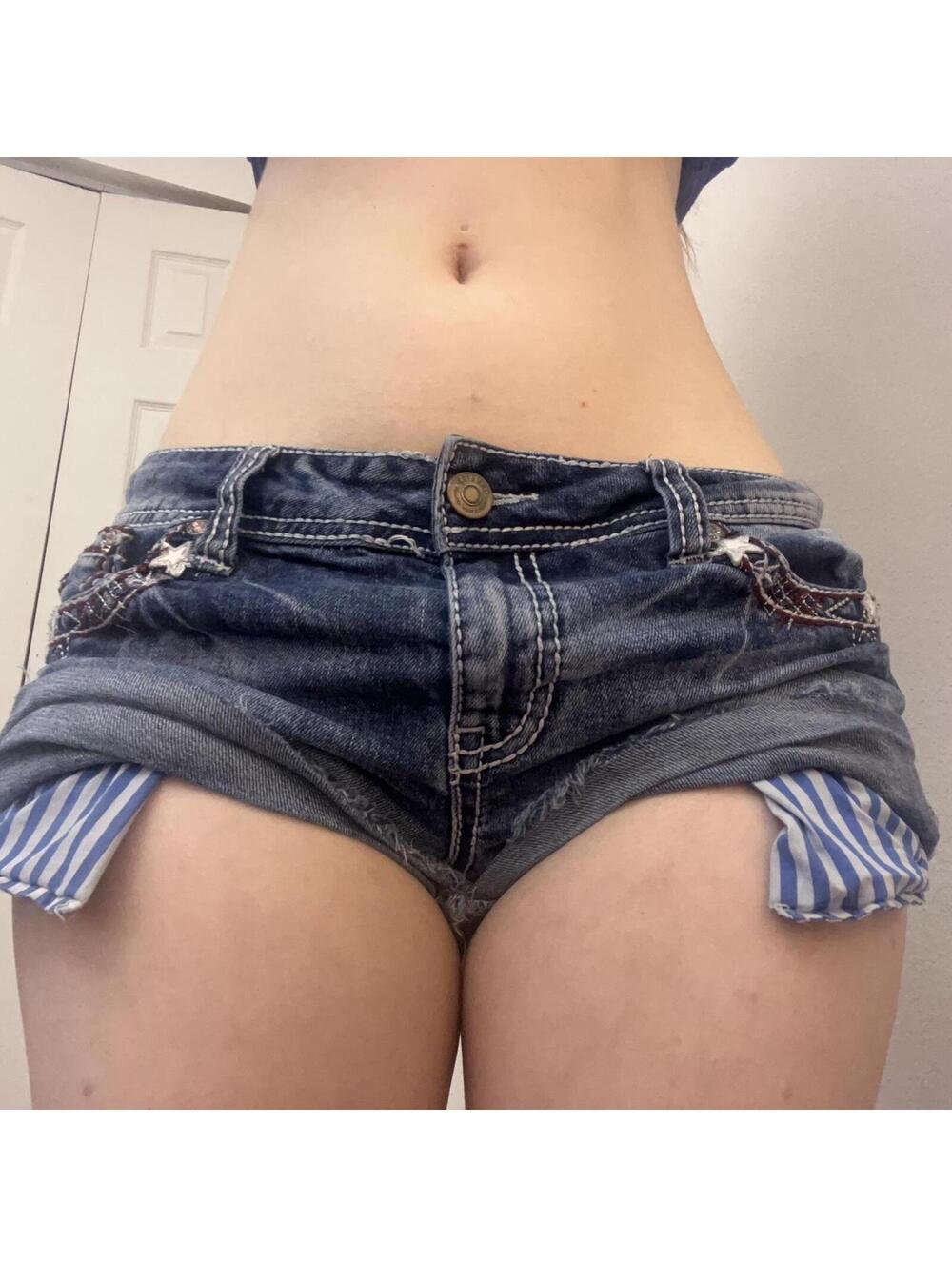 Low rise denim shorts with star embroidery